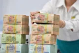 Doanh nghiệp Việt “ôm núi tiền” gửi ngân hàng kiếm nghìn tỷ mỗi năm